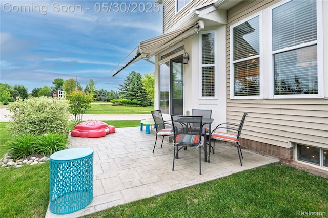 26727 Wilton Ct, New Hudson, MI 48165 - view of patio / terrace featuring outdoor dining space