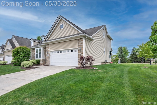 26727 Wilton Ct, New Hudson, MI 48165 - view of front of home with a front lawn, stone siding, driveway, and a garage