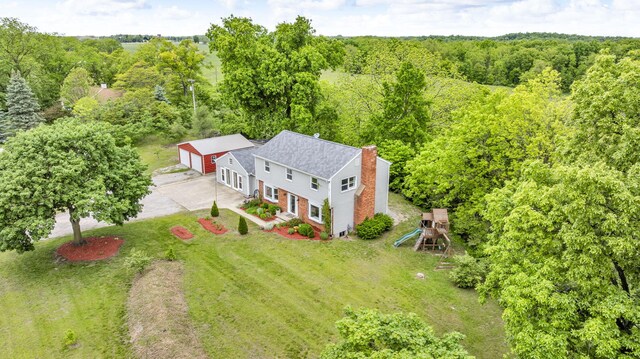 9410 US Highway 12, Brooklyn, MI 49230 - view from above of property with a heavily wooded area