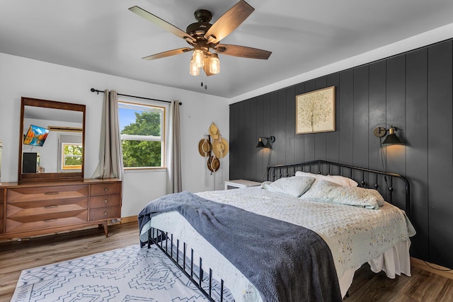 9410 US Highway 12, Brooklyn, MI 49230 - bedroom featuring wood finished floors and ceiling fan