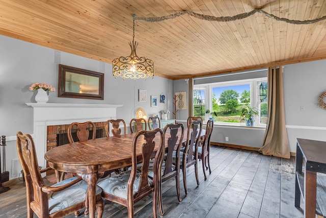 9410 US Highway 12, Brooklyn, MI 49230 - dining space with wood ceiling, light wood finished floors, a chandelier, and baseboards