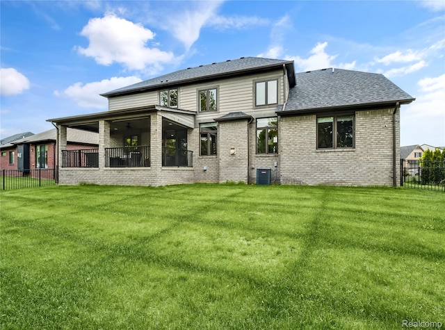 50011 Anita Way N, Macomb, MI 48044 - back of house with central air condition unit, brick siding, and roof with shingles