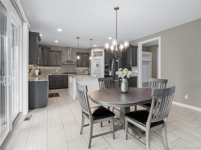 50011 Anita Way N, Macomb, MI 48044 - dining space featuring a chandelier, recessed lighting, and baseboards