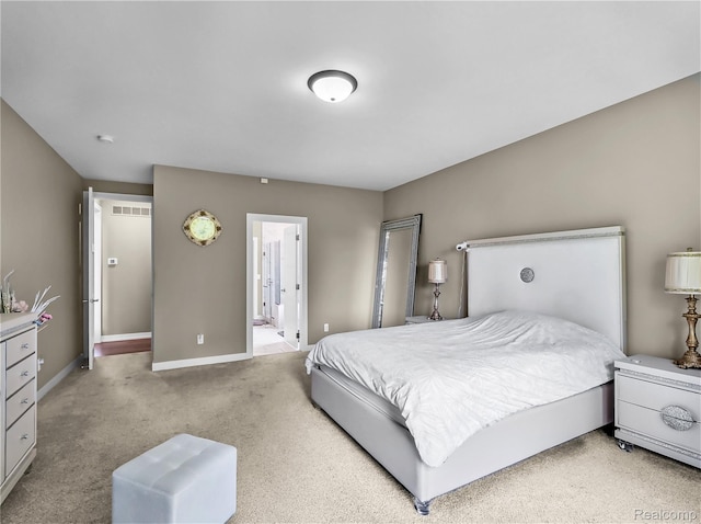 50011 Anita Way N, Macomb, MI 48044 - bedroom featuring carpet, baseboards, and connected bathroom
