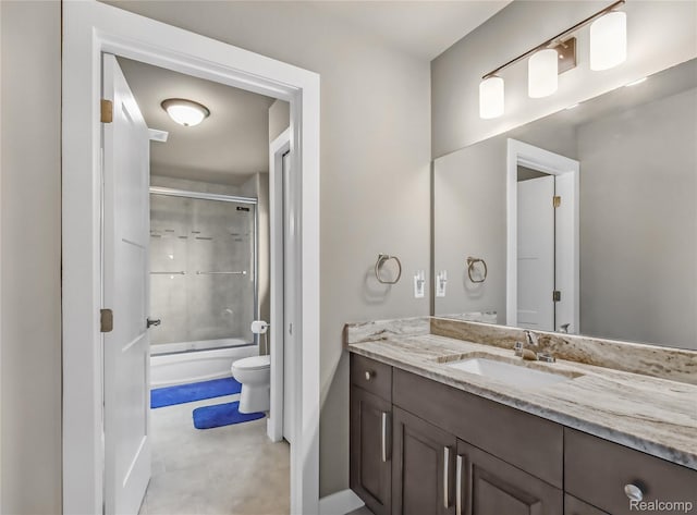 50011 Anita Way N, Macomb, MI 48044 - bathroom with toilet, vanity, shower / bath combination with glass door, and baseboards