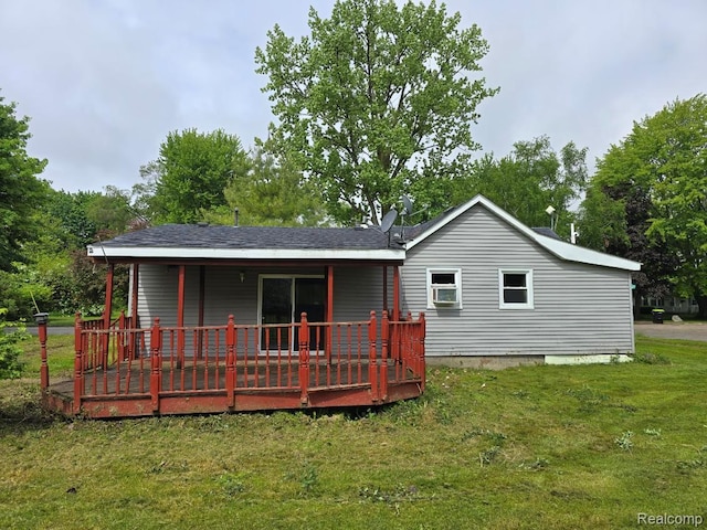 4297 Center St, Akron, MI 48701 - back of property featuring a lawn and a deck