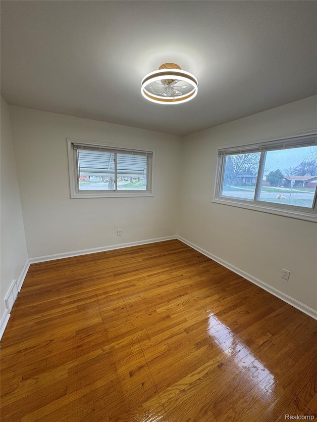 8511 Allen Rd, Allen Park, MI 48101 - empty room featuring light wood-type flooring and baseboards