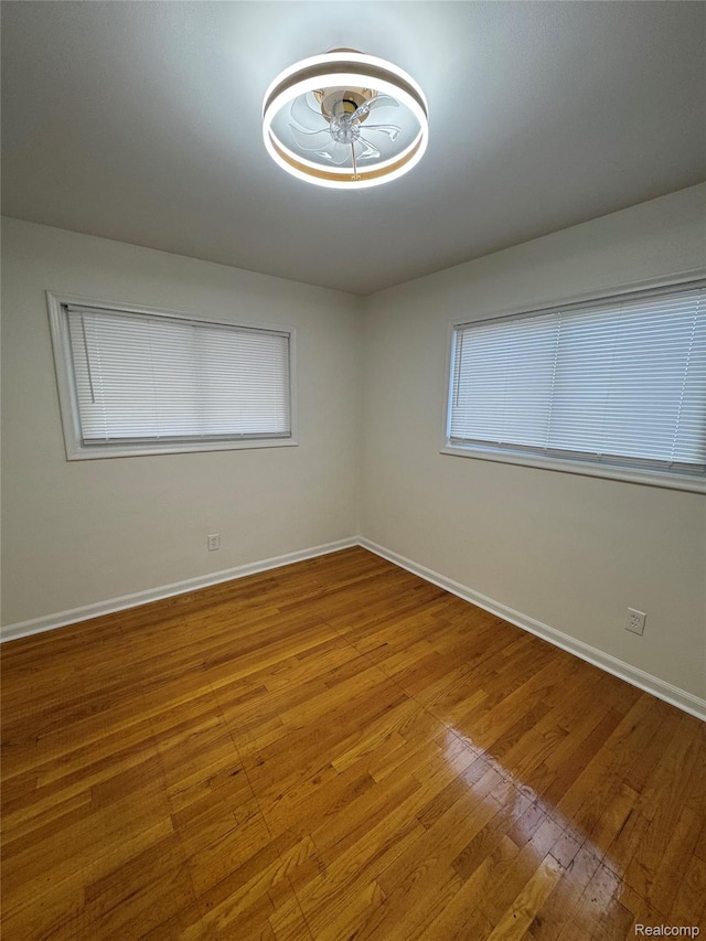 8511 Allen Rd, Allen Park, MI 48101 - unfurnished room featuring wood finished floors and baseboards