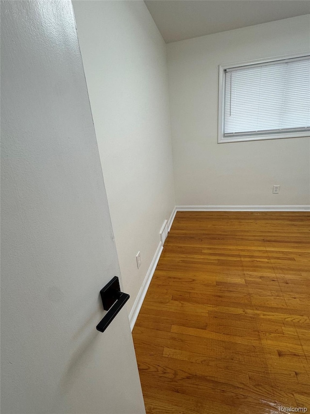 8511 Allen Rd, Allen Park, MI 48101 - unfurnished room with wood finished floors and baseboards