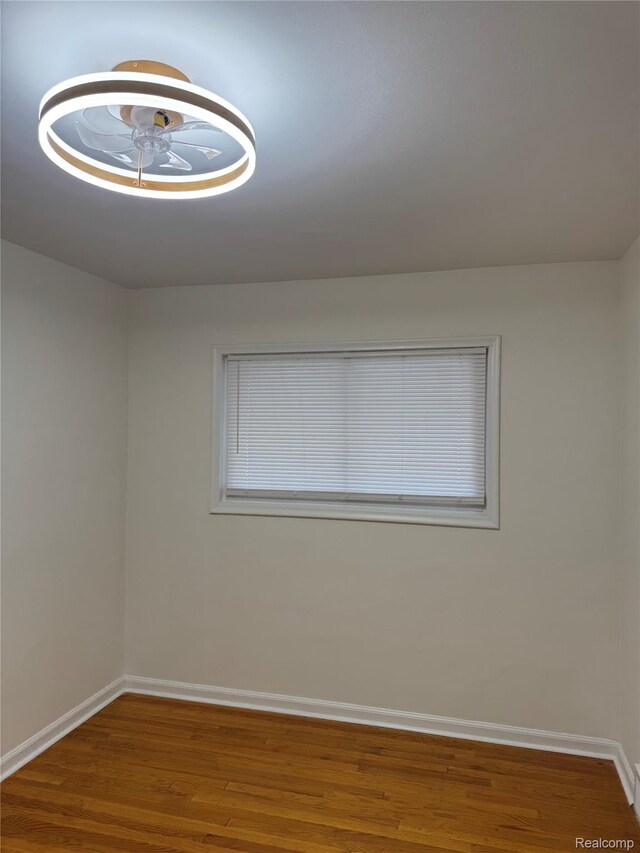 8511 Allen Rd, Allen Park, MI 48101 - unfurnished room with wood finished floors and baseboards