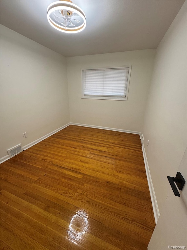 8511 Allen Rd, Allen Park, MI 48101 - unfurnished room featuring wood finished floors and baseboards