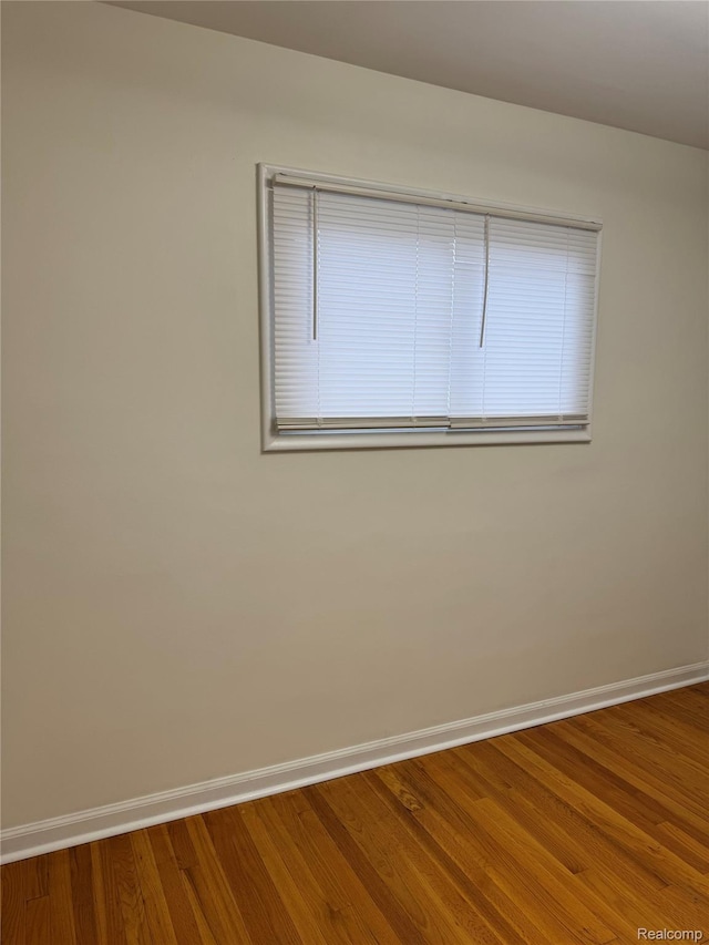 8511 Allen Rd, Allen Park, MI 48101 - empty room featuring baseboards and wood finished floors