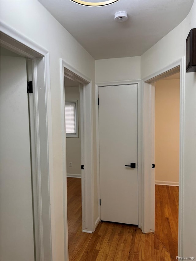 8511 Allen Rd, Allen Park, MI 48101 - hallway featuring light wood-type flooring and baseboards