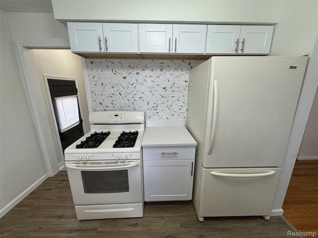 8511 Allen Rd, Allen Park, MI 48101 - kitchen featuring white appliances, backsplash, dark wood-style floors, white cabinets, and light countertops