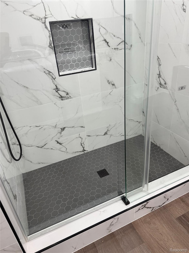 8511 Allen Rd, Allen Park, MI 48101 - full bath with a marble finish shower and wood finished floors