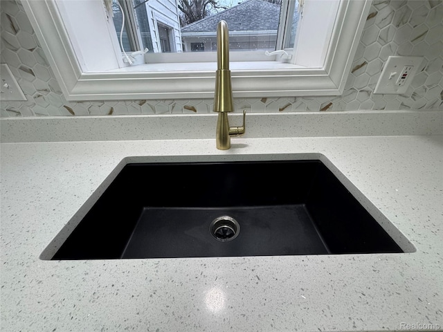 8511 Allen Rd, Allen Park, MI 48101 - kitchen view of a sink and light stone countertops