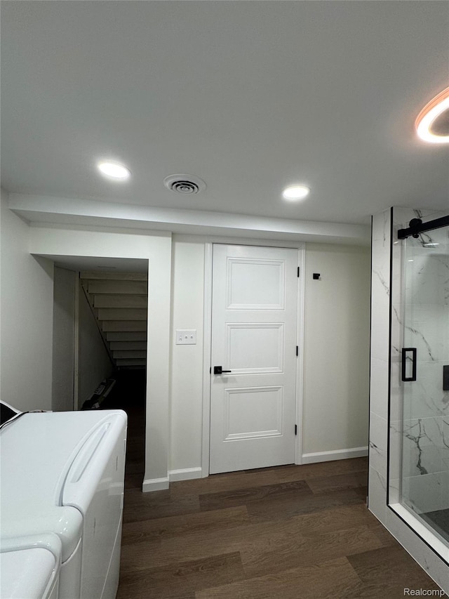8511 Allen Rd, Allen Park, MI 48101 - hall featuring independent washer and dryer, dark wood-type flooring, recessed lighting, baseboards, and stairs