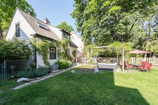 1512 Brooklyn Ave, Ann Arbor, MI 48104 - view of yard with central AC and an outdoor hangout area