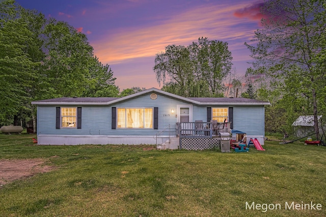 7813 River St, Belding, MI 48809 - view of front of home featuring a front yard