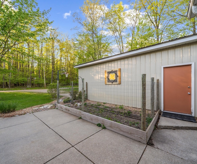 4841 Pear Way, Farwell, MI 48622 - view of outdoor structure featuring a garden