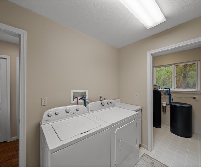4841 Pear Way, Farwell, MI 48622 - laundry area with independent washer and dryer and baseboards