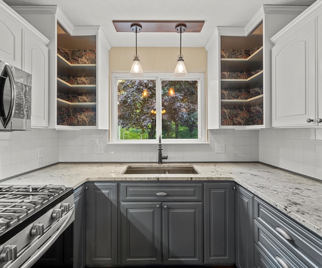 4841 Pear Way, Farwell, MI 48622 - kitchen featuring a sink, white cabinets, backsplash, and gray cabinetry