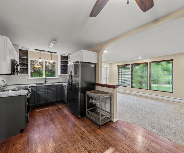 4841 Pear Way, Farwell, MI 48622 - kitchen featuring appliances with stainless steel finishes, ceiling fan, a sink, arched walkways, and gray cabinets