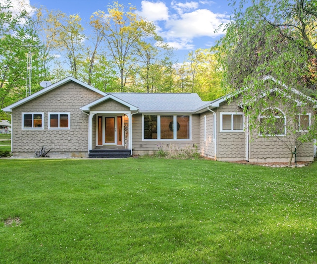4841 Pear Way, Farwell, MI 48622 - view of front of property with a front lawn