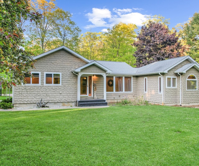 4841 Pear Way, Farwell, MI 48622 - view of front of property featuring a front lawn