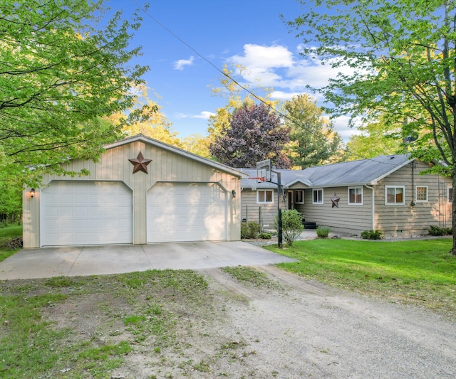 4841 Pear Way, Farwell, MI 48622 - ranch-style home featuring a garage and an outdoor structure