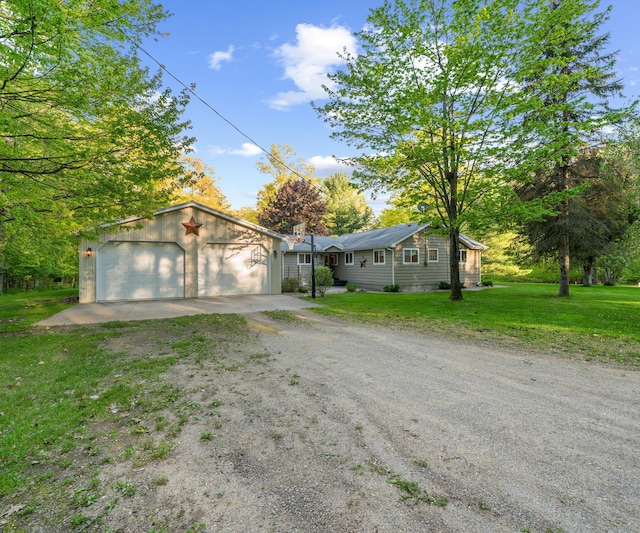 4841 Pear Way, Farwell, MI 48622 - single story home with a front yard, dirt driveway, and a detached garage