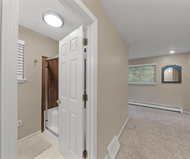 4841 Pear Way, Farwell, MI 48622 - hallway with a baseboard heating unit, baseboards, and carpet flooring