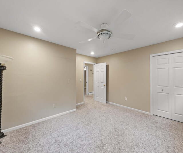 4841 Pear Way, Farwell, MI 48622 - unfurnished bedroom featuring light carpet, baseboards, recessed lighting, ceiling fan, and a closet