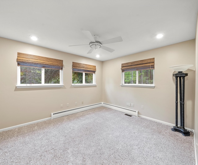 4841 Pear Way, Farwell, MI 48622 - empty room featuring carpet flooring, ceiling fan, baseboards, recessed lighting, and a baseboard radiator