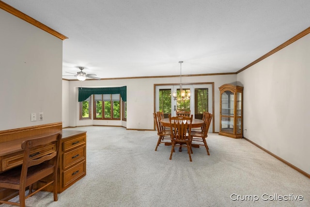 2870 S Wentward Ct, Hudsonville, MI 49426 - dining space with crown molding, light colored carpet, baseboards, and a chandelier