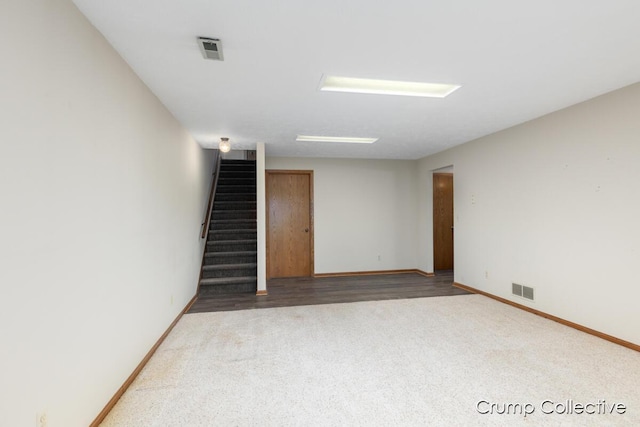 2870 S Wentward Ct, Hudsonville, MI 49426 - unfurnished room with carpet flooring, stairs, and baseboards