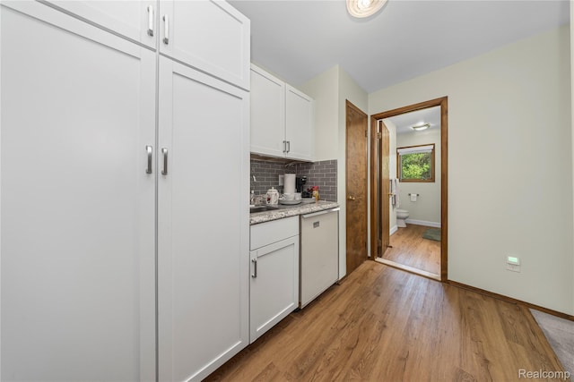 29832 High Valley Ct, Farmington Hills, MI 48331 - kitchen featuring dishwasher, light wood-type flooring, backsplash, and white cabinets