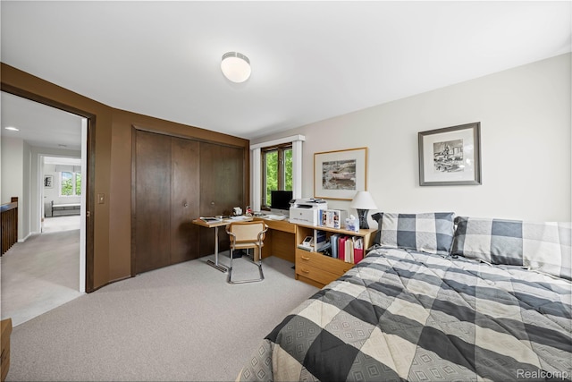 29832 High Valley Ct, Farmington Hills, MI 48331 - bedroom featuring light carpet, a closet, and a desk