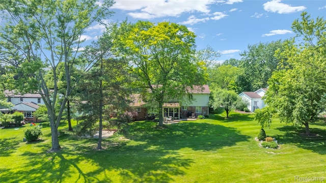 29832 High Valley Ct, Farmington Hills, MI 48331 - view of grassy yard featuring a patio