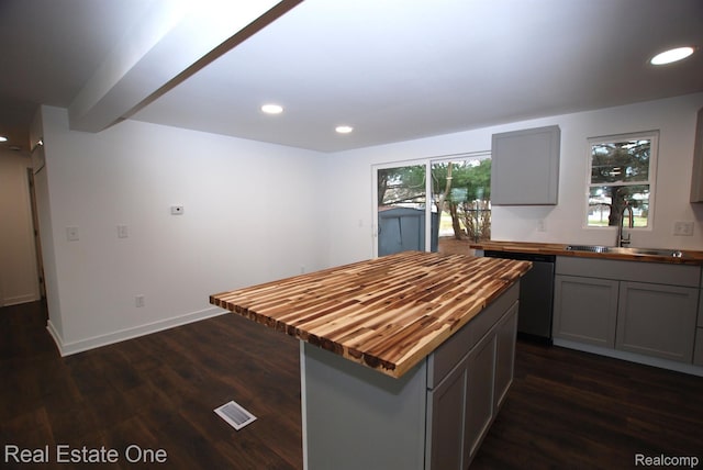 12357 Raymond Dr, Clio, MI 48420 - kitchen with wood counters, a sink, gray cabinets, stainless steel dishwasher, and recessed lighting
