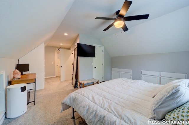 1227 Columbus Ave, Grand Haven, MI 49417 - bedroom featuring light carpet, vaulted ceiling, a ceiling fan, and recessed lighting