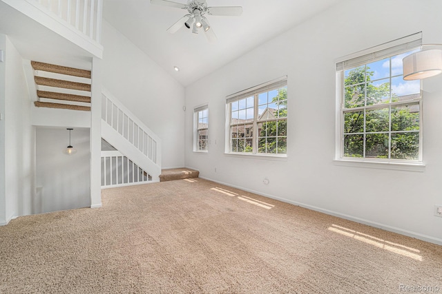 170 Allenhurst Ave, Royal Oak, MI 48067 - unfurnished living room featuring carpet, plenty of natural light, a ceiling fan, stairway, and high vaulted ceiling