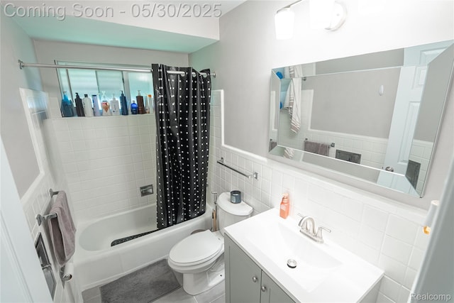 7265 Hillside Dr, Dearborn, MI 48127 - full bath with tile walls, shower / bath combo with shower curtain, vanity, toilet, and wainscoting