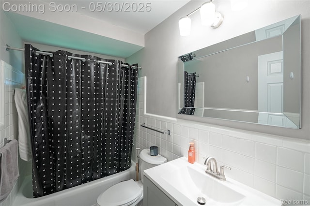 7265 Hillside Dr, Dearborn, MI 48127 - bathroom featuring shower / bath combo, vanity, toilet, and tile walls