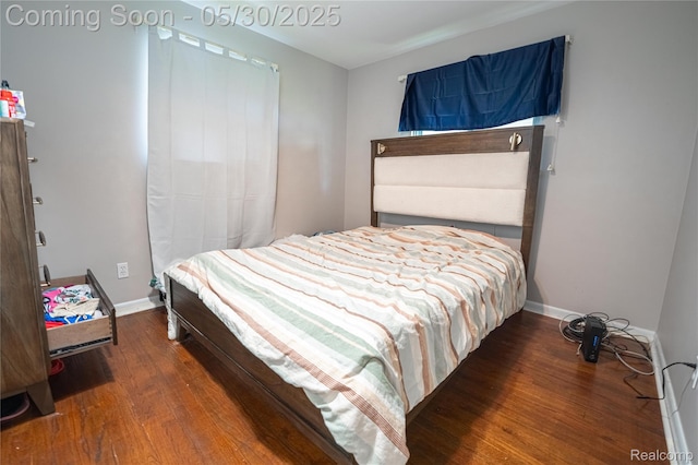 7265 Hillside Dr, Dearborn, MI 48127 - bedroom with wood finished floors and baseboards