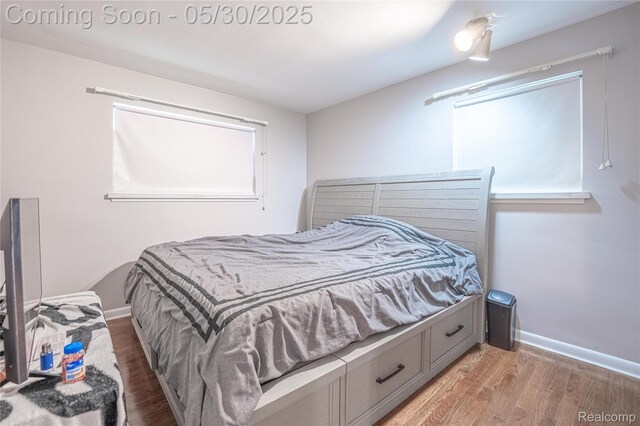 7265 Hillside Dr, Dearborn, MI 48127 - bedroom featuring wood finished floors and baseboards