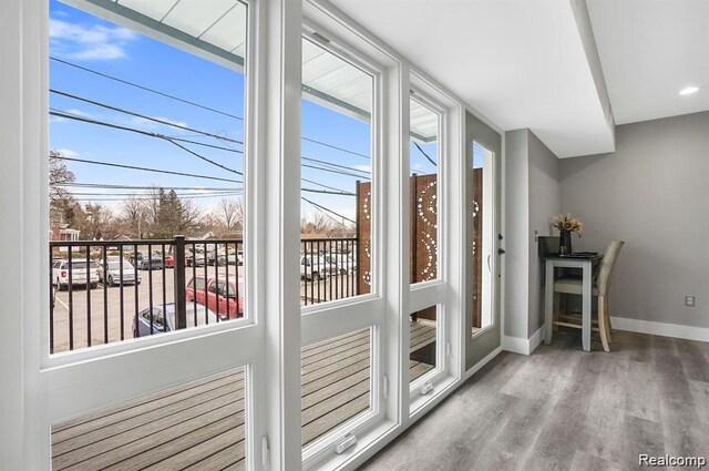 344 Main St Unit 300, Milford, MI 48381 - entryway featuring wood finished floors, baseboards, and recessed lighting