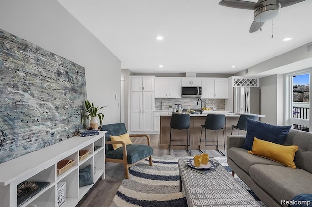 344 Main St Unit 300, Milford, MI 48381 - living area with recessed lighting, wood finished floors, and ceiling fan