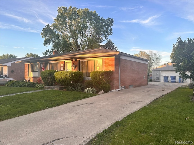 26304 Patricia Ave, Sterling Heights, MI 48091 - ranch-style home featuring brick siding and a front yard