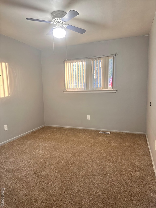 26304 Patricia Ave, Sterling Heights, MI 48091 - carpeted empty room with ceiling fan and baseboards